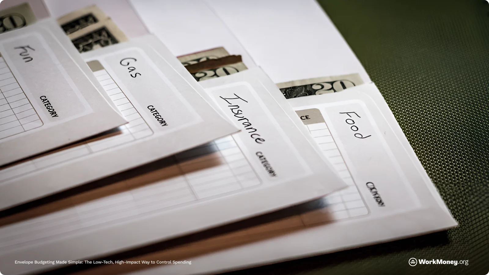 A set of envelopes with labels and money in them.