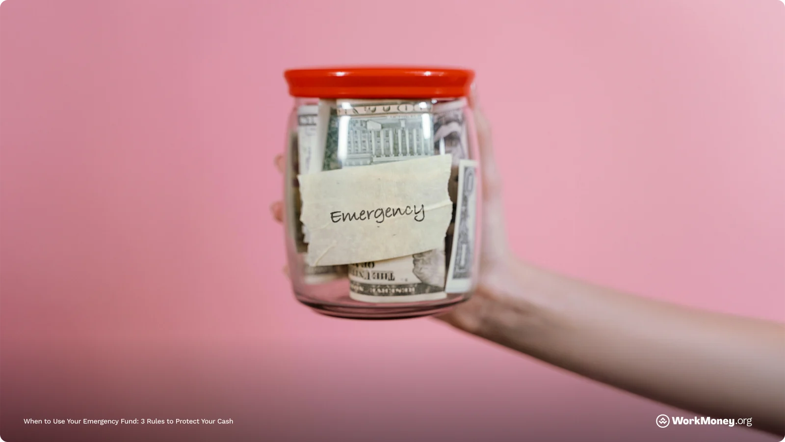 A jar of money with label "emergency" on it