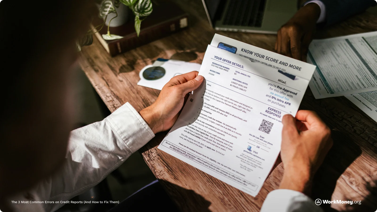 Man looking at credit report