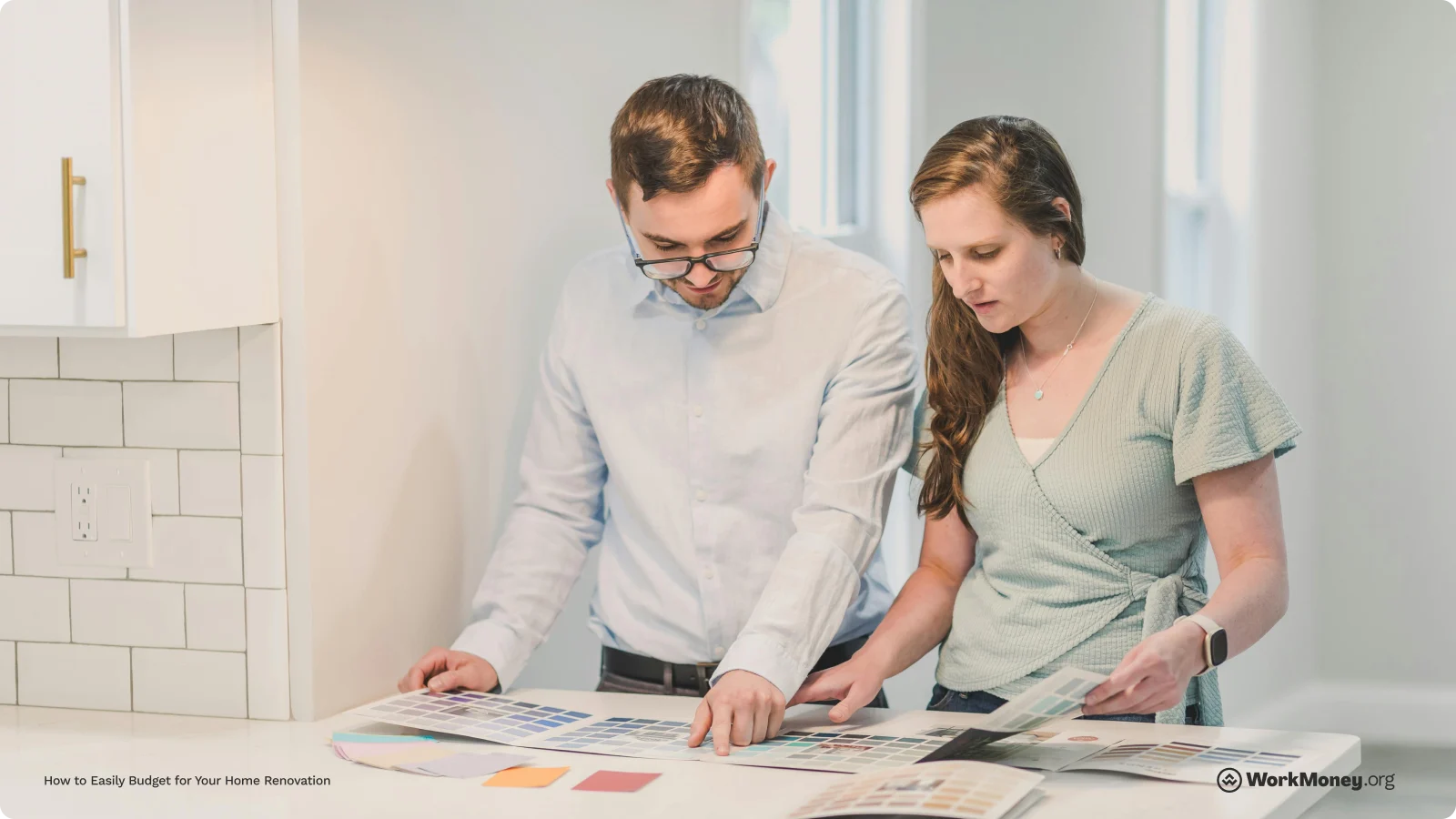 Couple looking at home renovation ideas together