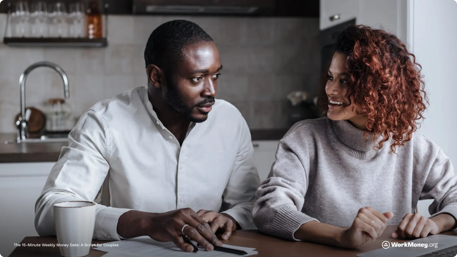 A couple discuss their family budget.