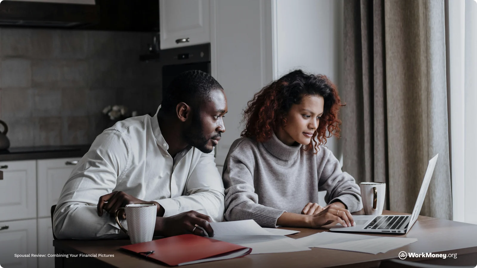 Couple Look Over Finances Together