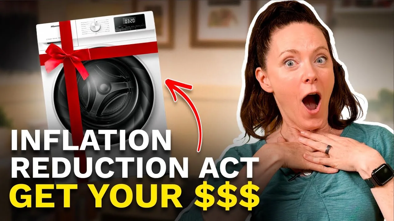 A woman with brown hair has her mouth open and is clutching her chest with her hands. There are words in white and yellow that say Inflation Reduction Act Get Your $$$ with a red arrow pointing to a washing machine with a red bow on it.