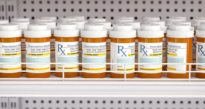 A shelf full of prescription bottles