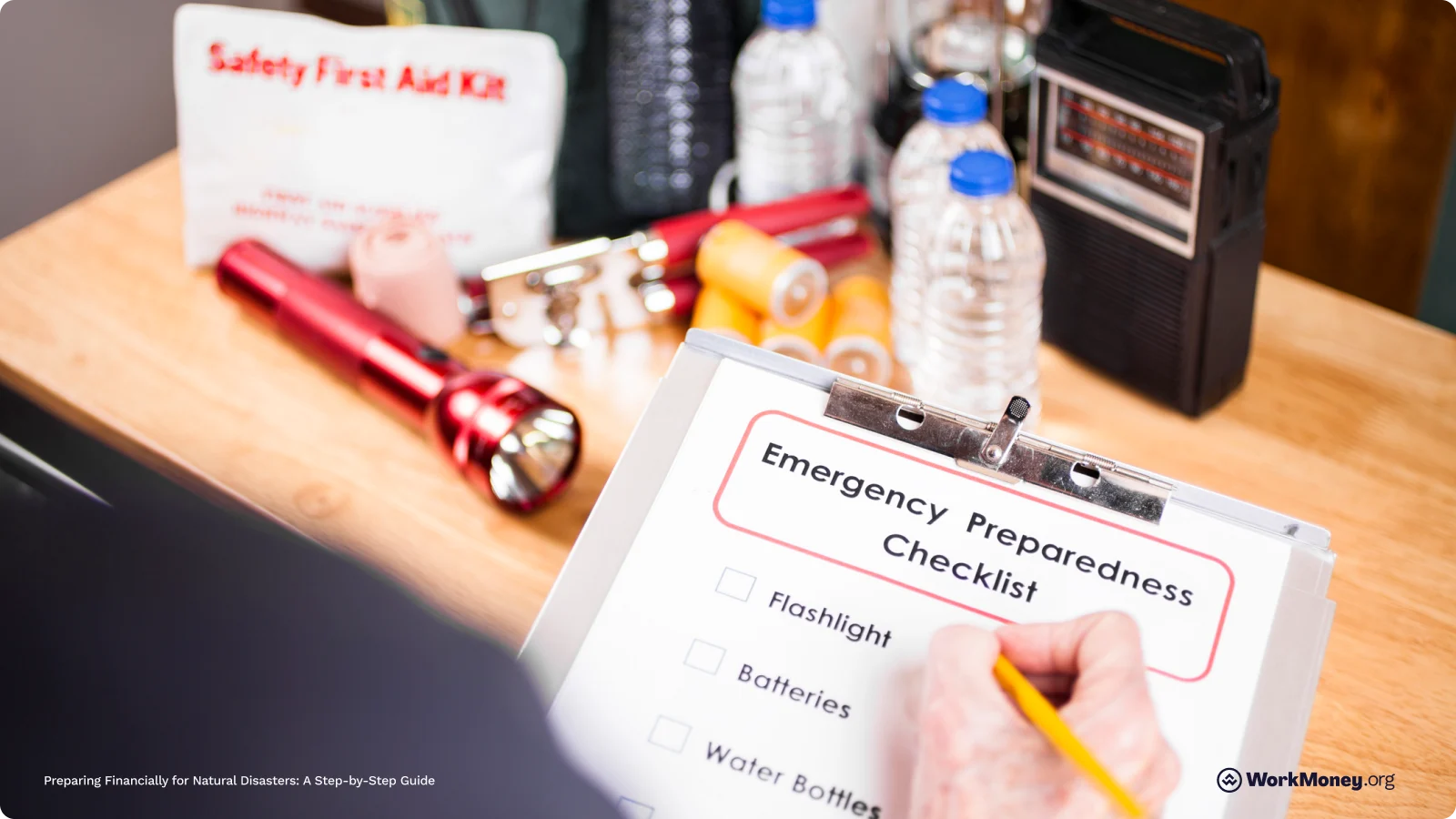 Person checks off items from an emergency preparedness list.