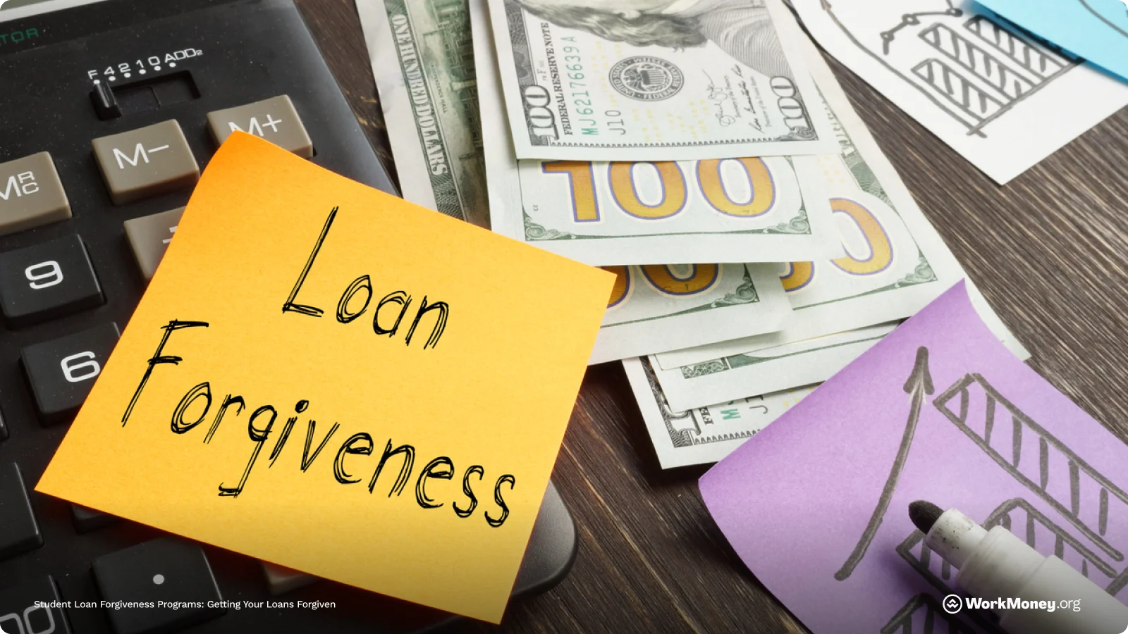 Money next to note about loan forgiveness