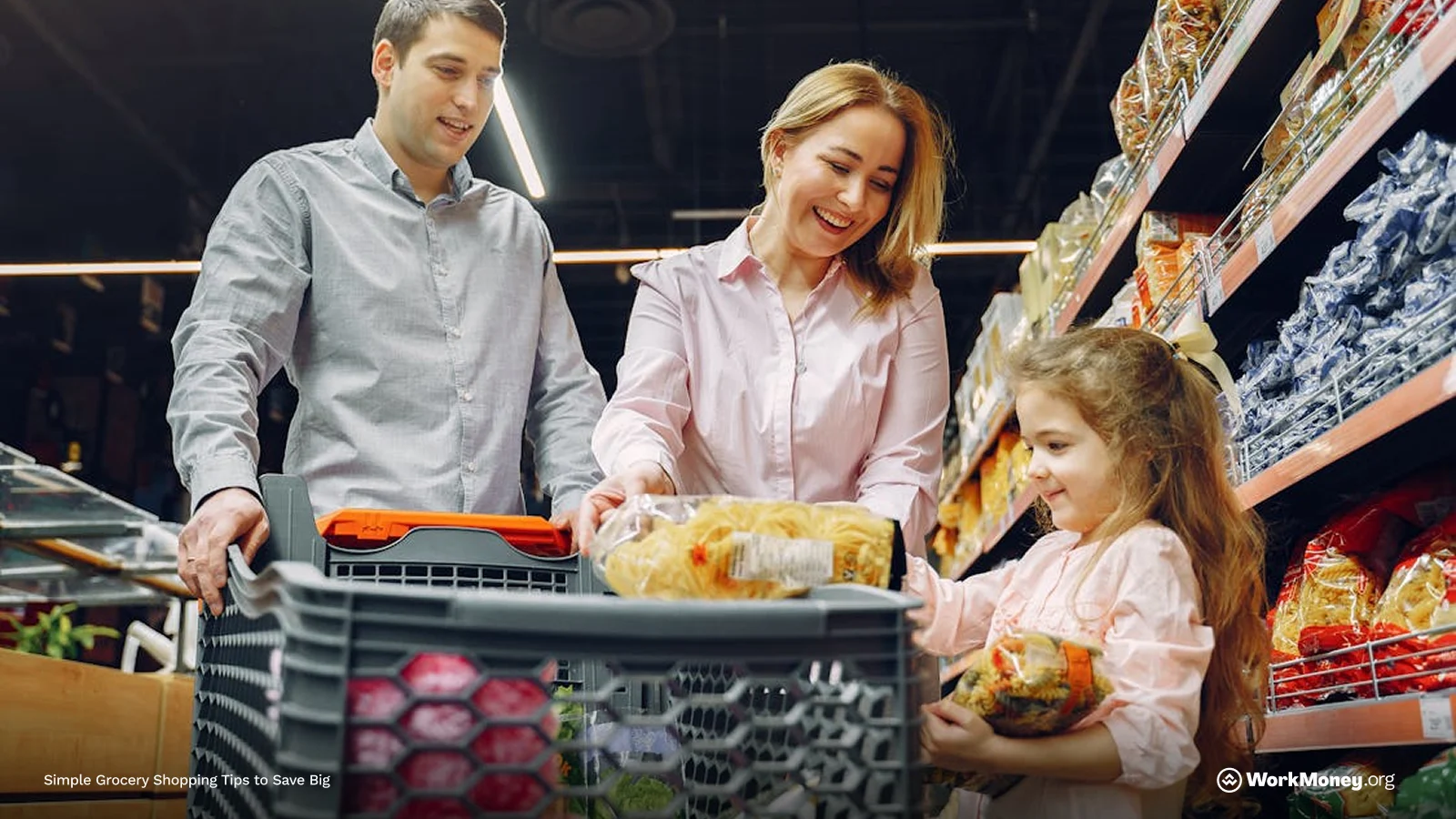 A smiling family shops for groceries together; a man pushes the cart while a woman and young girl pick out pasta from store shelves.