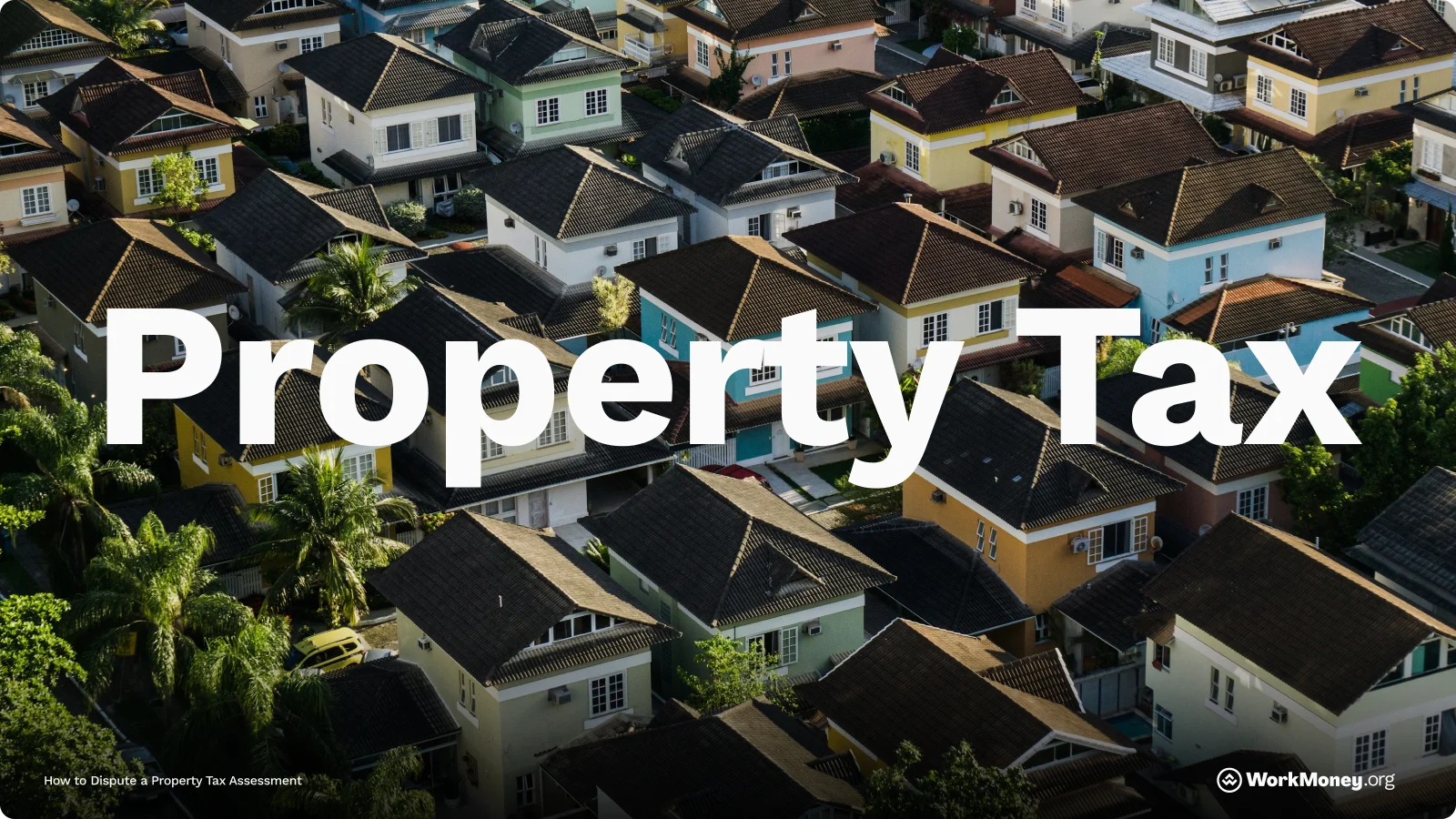 A neighborhood of houses overlaid with the words Property Tax