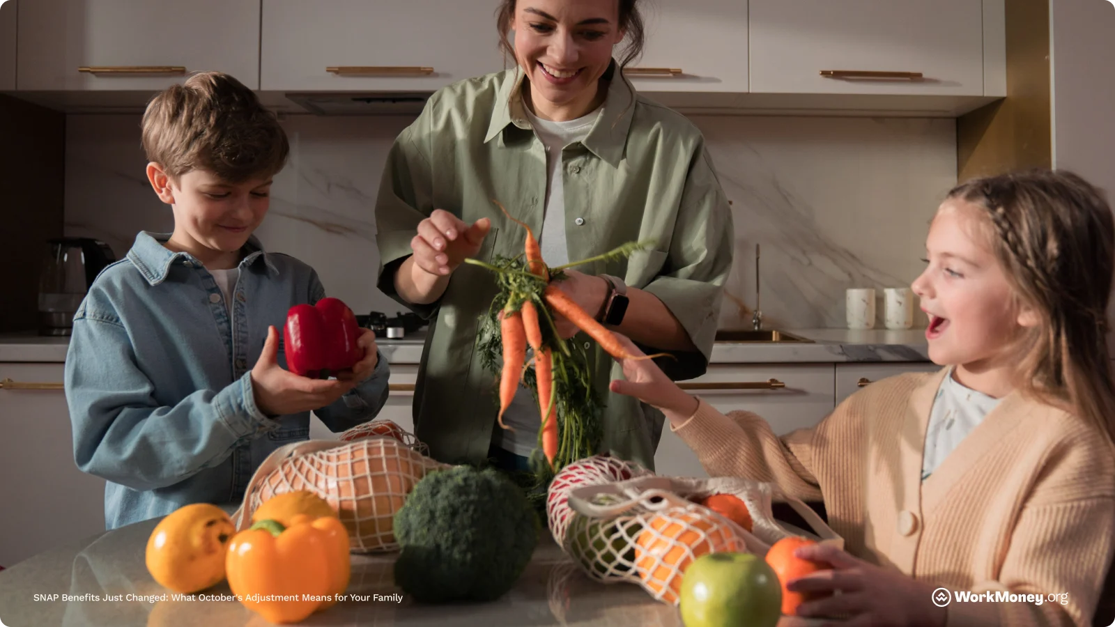 A family looks at fresh vegetables at their kitchen counter.
