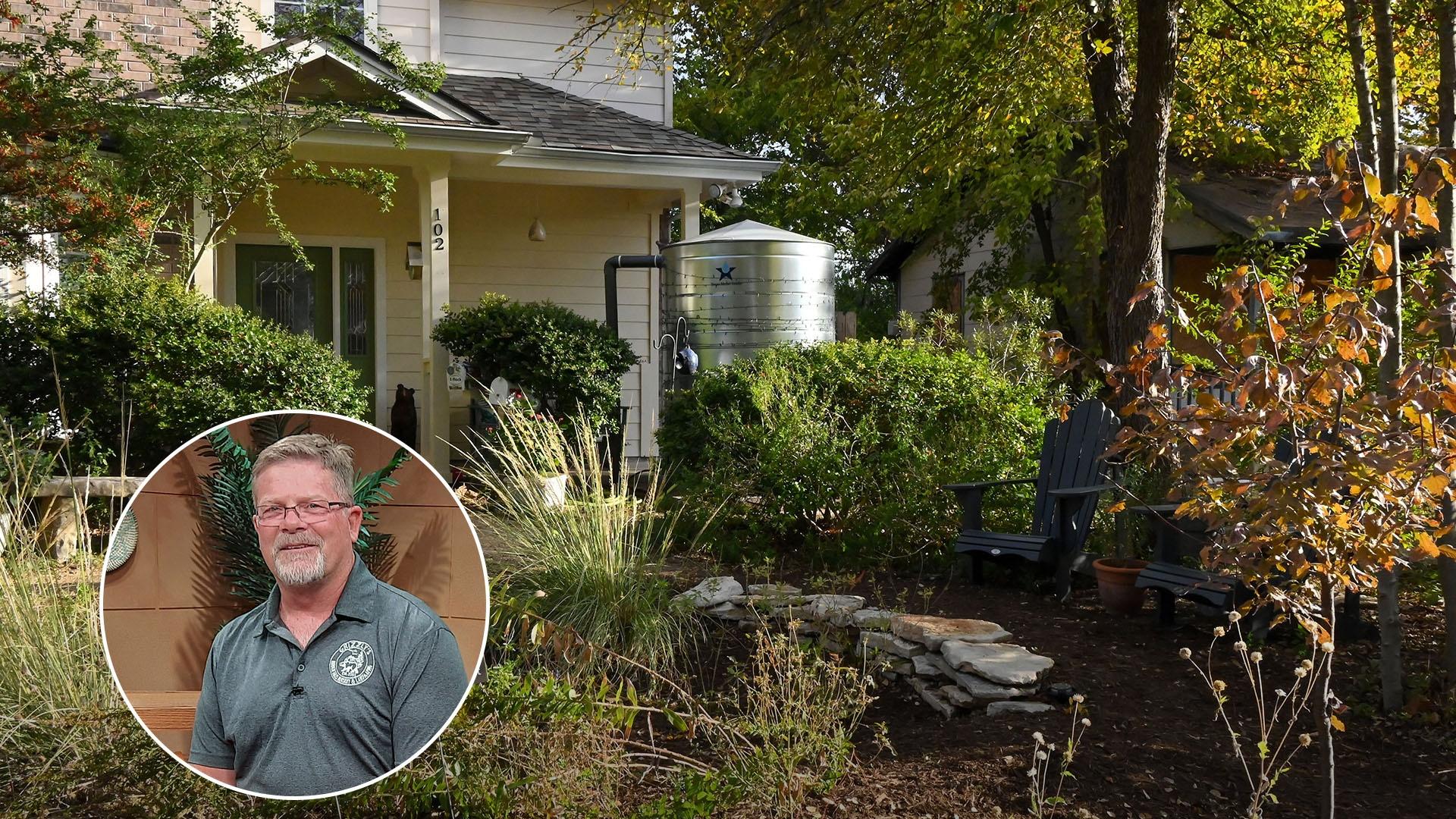 A house with a rain collection barrel
