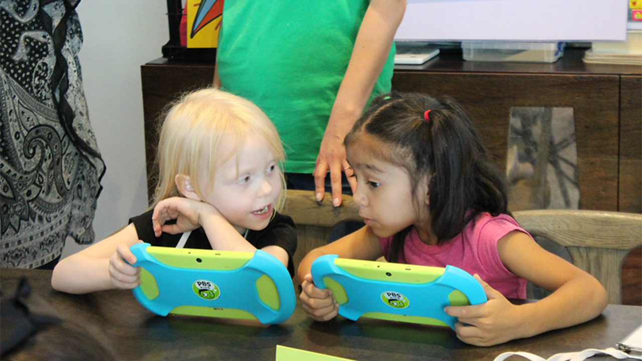 Young children play educational games