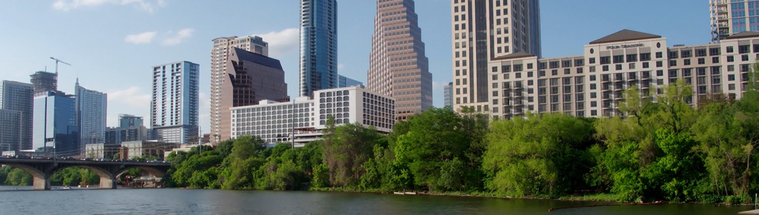 Austin Skyline from Lady Bird Lake on a sunny day..