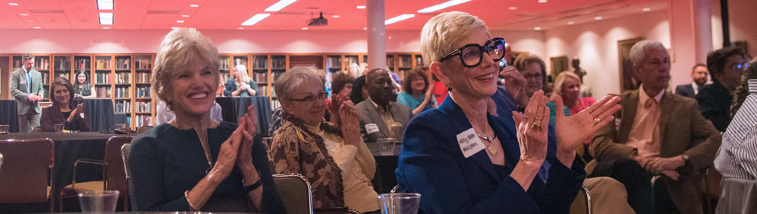 Members of the Austin PBS Leadership Circle applauding..