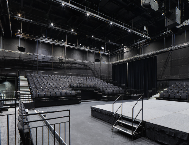 The new Pfluger Keller Community Soundstage, with stage and seating, in black and white