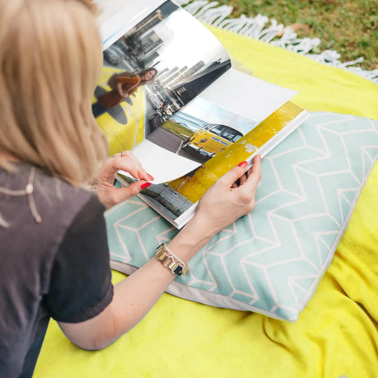 Women outside with photo book