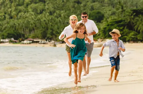 family running beach