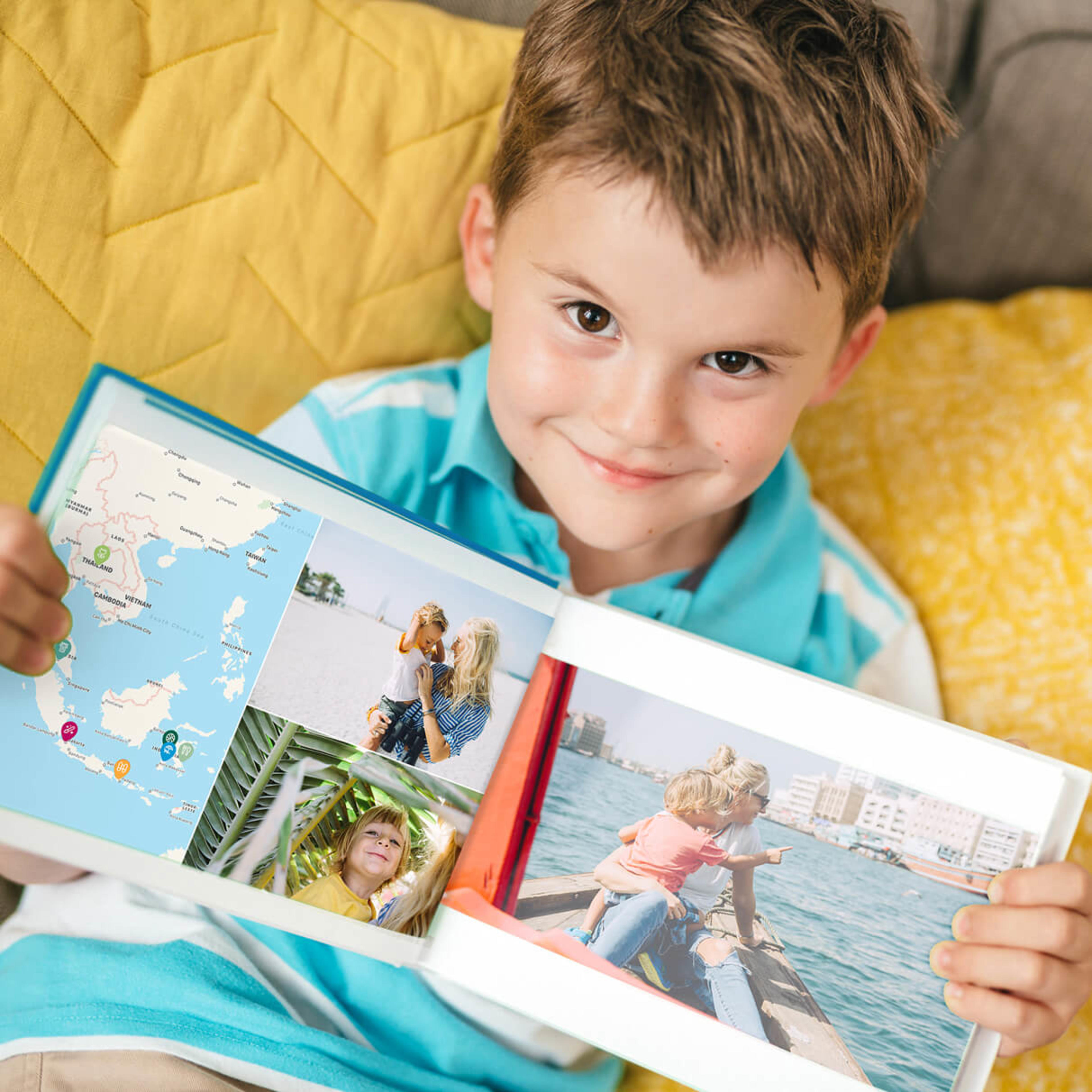Boy with open photo book