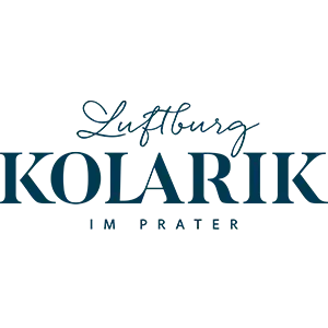 Logo mit dem Schriftzug Luftburg Kolarik in stilisierter blauer Schrift. Darunter, in kleinerer Schrift, stehen die Worte Bio und Erlebnis.