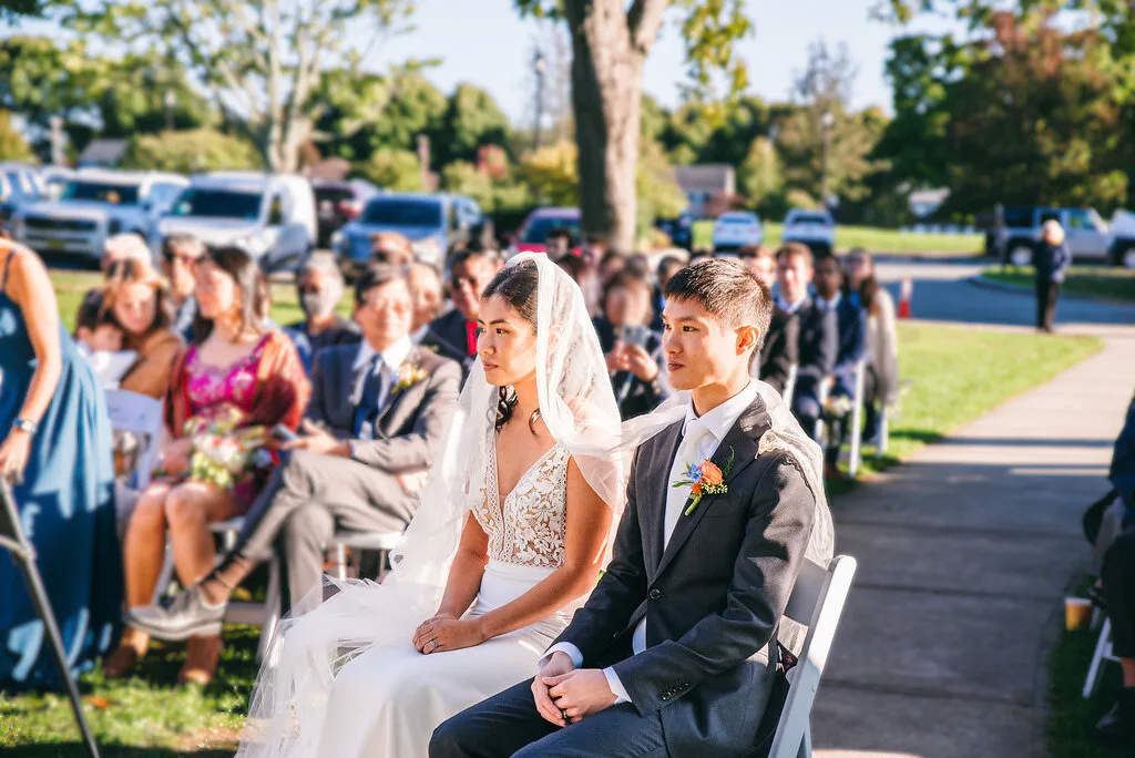 Filipino veil and cord ritual at a non-denominational wedding