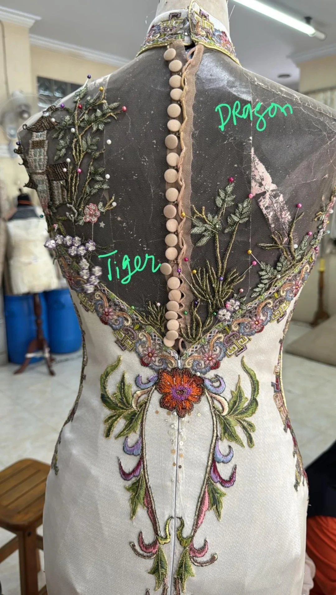 Sketch for placement of family Zodiac symbols on the wedding dress.