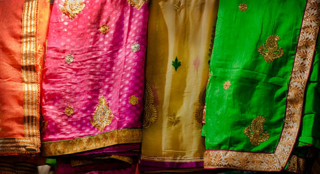 The colors and fabrics of Indian wedding attire vary widely by region and occasion. Source: https://www.istockphoto.com/photo/variegated-multi-colored-fabrics-gm513544006-87662537