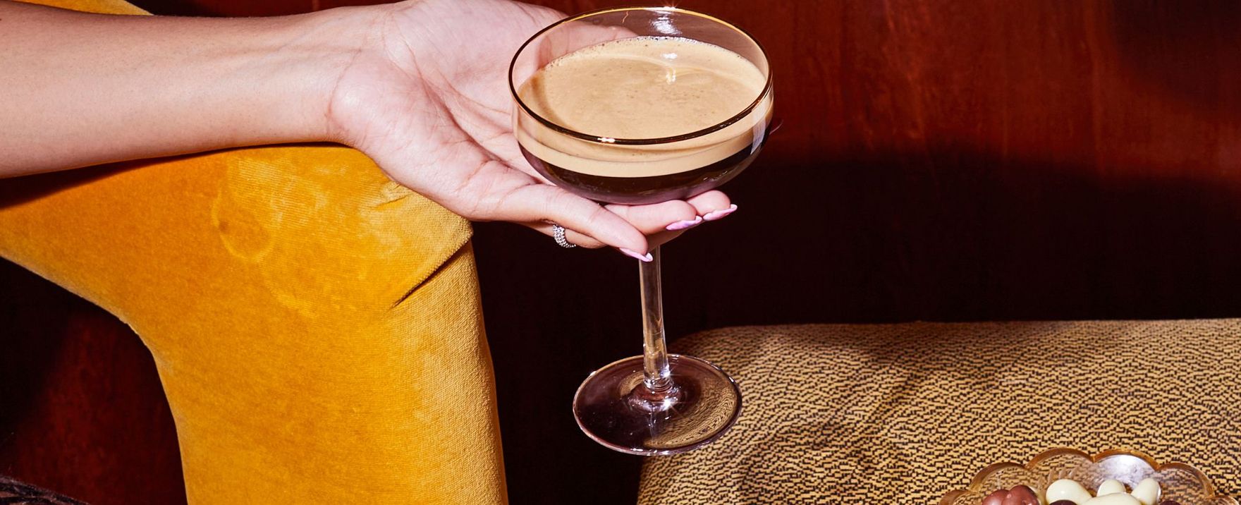 Woman holding a cocktail