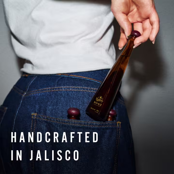 1942 Bottle in Jean Pocket - Image with text: 'Handcrafted in Jalisco'