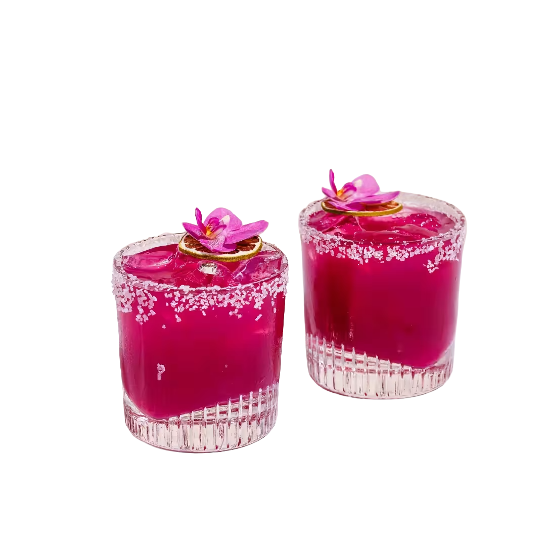 Transparent image of two Prickly pear cocktails on a coloured background.