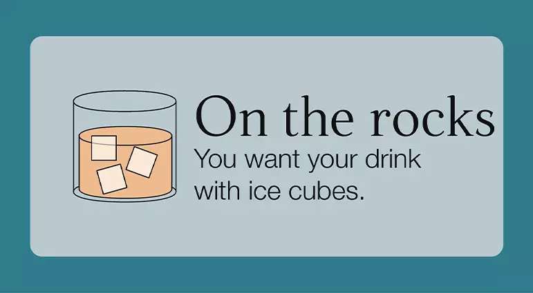 Illustration of a glass with brown liquid and ice cubes, labeled On the rocks: You want your drink with ice cubes.