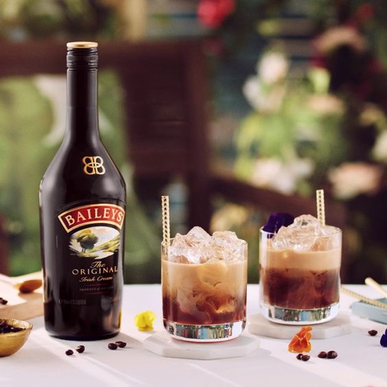 Baileys Original lifestyle image with glass and roses