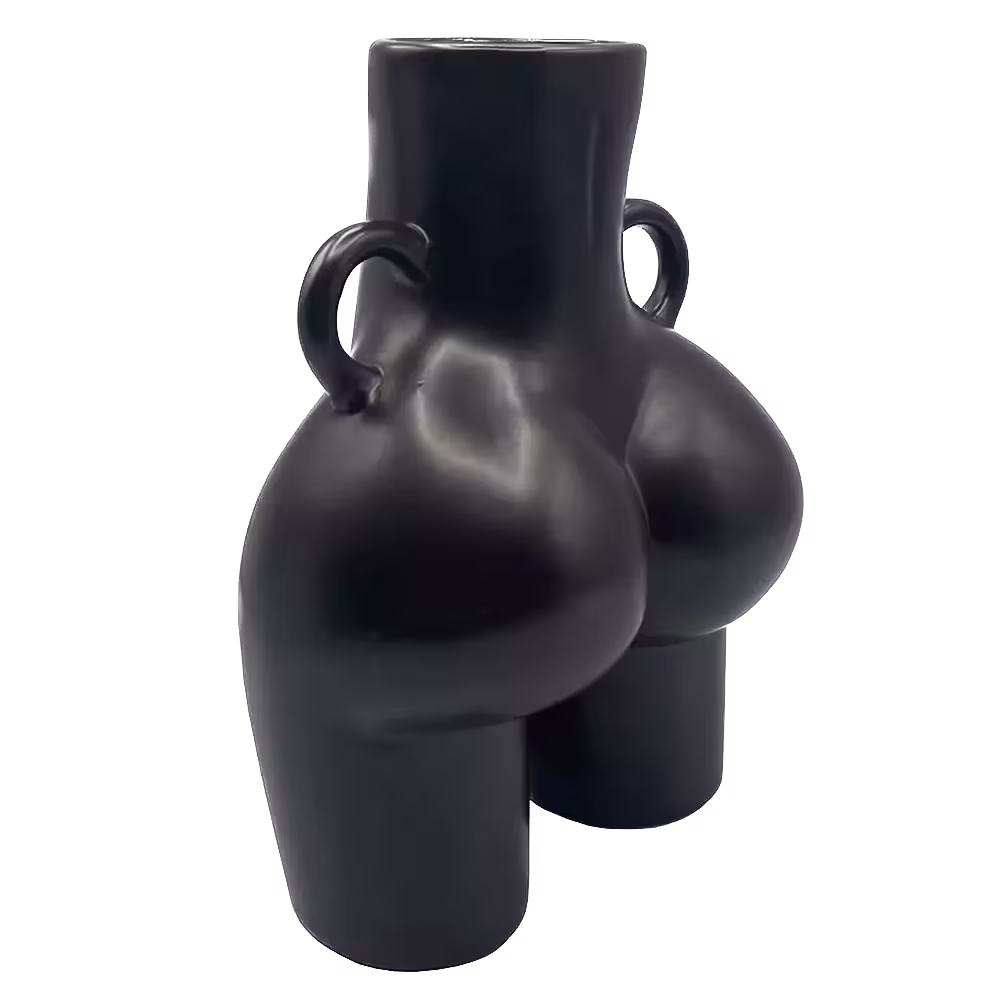 Matte black ceramic vase with a geometric, abstract shape featuring two rounded sections and two handles on each side.