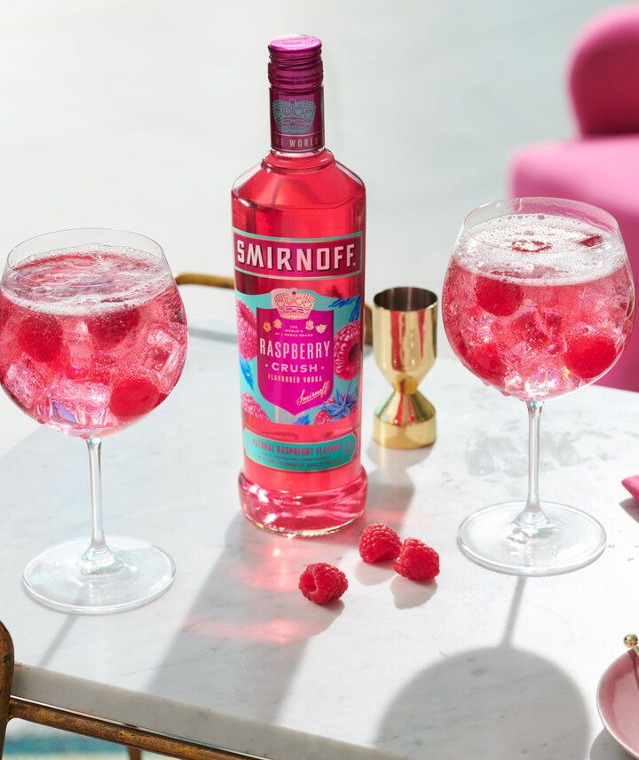 Smirnoff Raspberry Crush with cocktails on a table