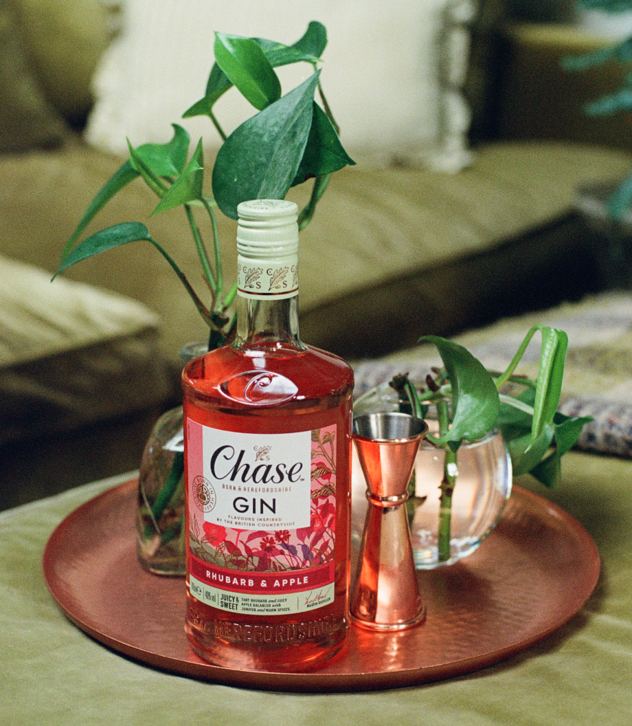 Chase Rhubarb and Apple Gin on table with Jigger