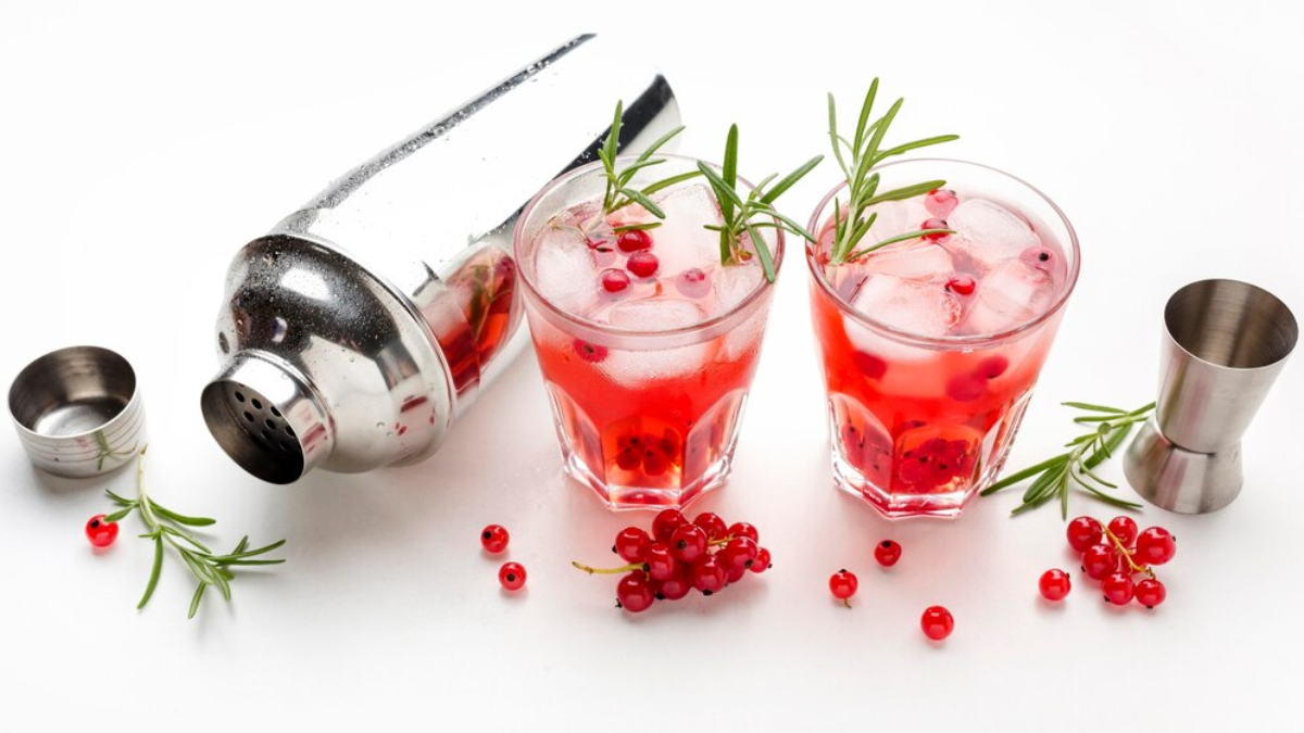 Cosmopolitan cocktail with herbs