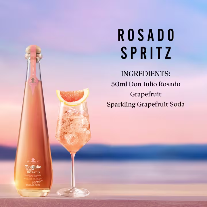 The image displays a bottle of Don Julio Rosado tequila next to a glass of Rosado Spritz garnished with a grapefruit slice. The background is a soft gradient of pink and blue. Text reads: "Rosado Spritz - Ingredients: 50ml Don Julio Rosado, Grapefruit, Sparkling Grapefruit Soda."