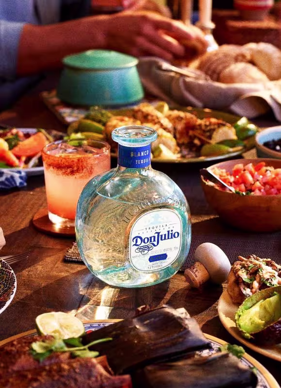 Don Julio next to a table of food