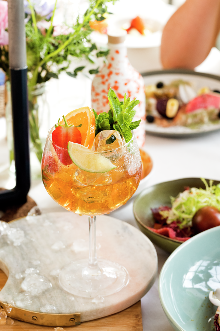 Distilled gin cocktail with all the garnishes!