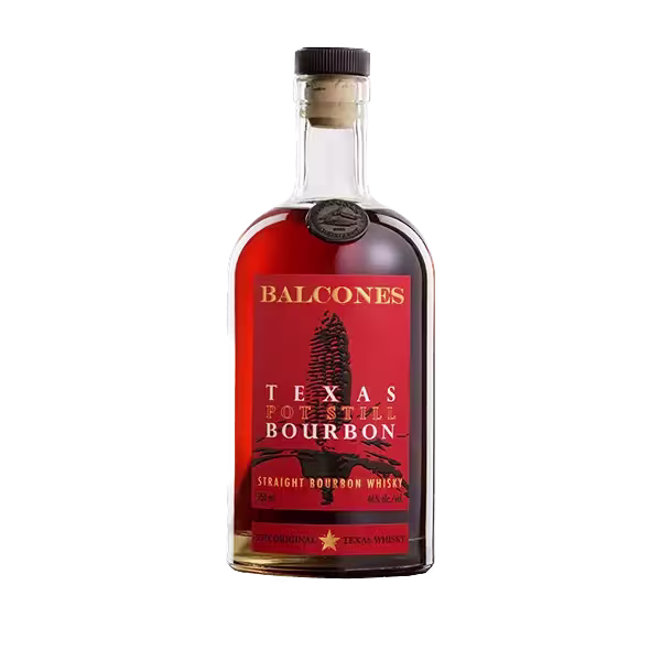 A bottle of Balcones Texas Pot Still Bourbon with a red label featuring a tree graphic and gold text, containing straight bourbon whiskey.