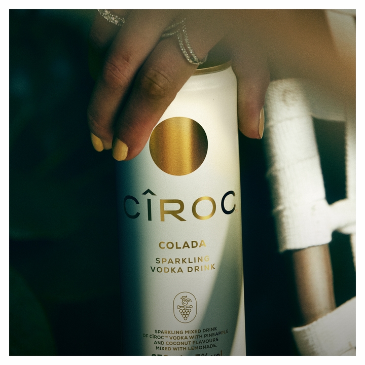 Cîroc Colada Sparkling Vodka Drink Can in a persons hand