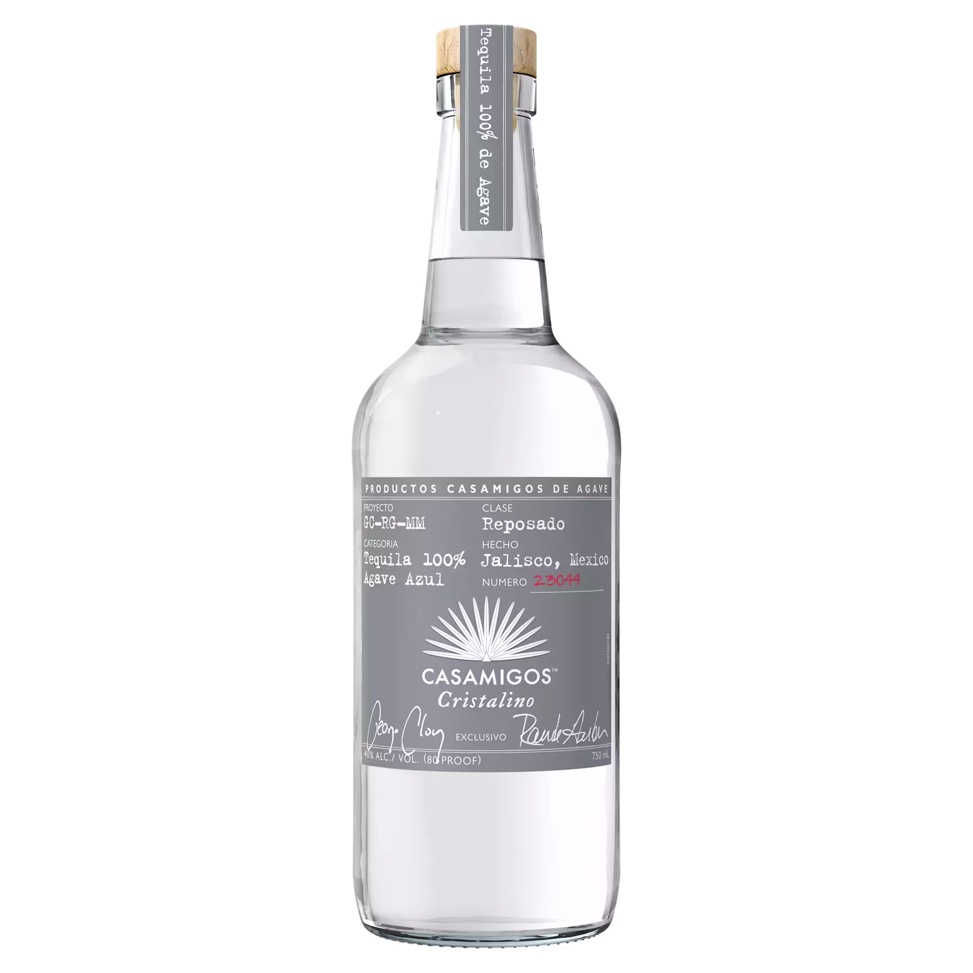 A clear glass bottle of Casamigos Cristalino tequila with a gray and white label and a wooden cork top.