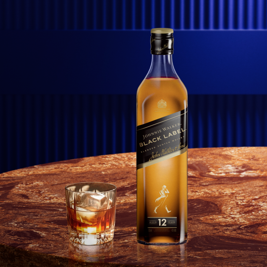Bottle of Johnnie Walker Black label and a dram of whisky