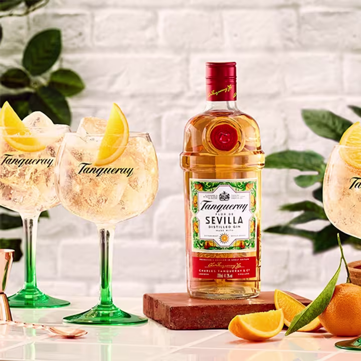 Tanqueray Flor de Sevilla Orange Flavoured Distilled Gin, 70 Cl lifestyle Tanqueray on table