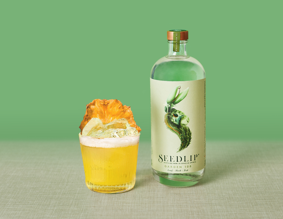 Seedlip Garden Bottle next to Pineapple and Jalapeño Margarita