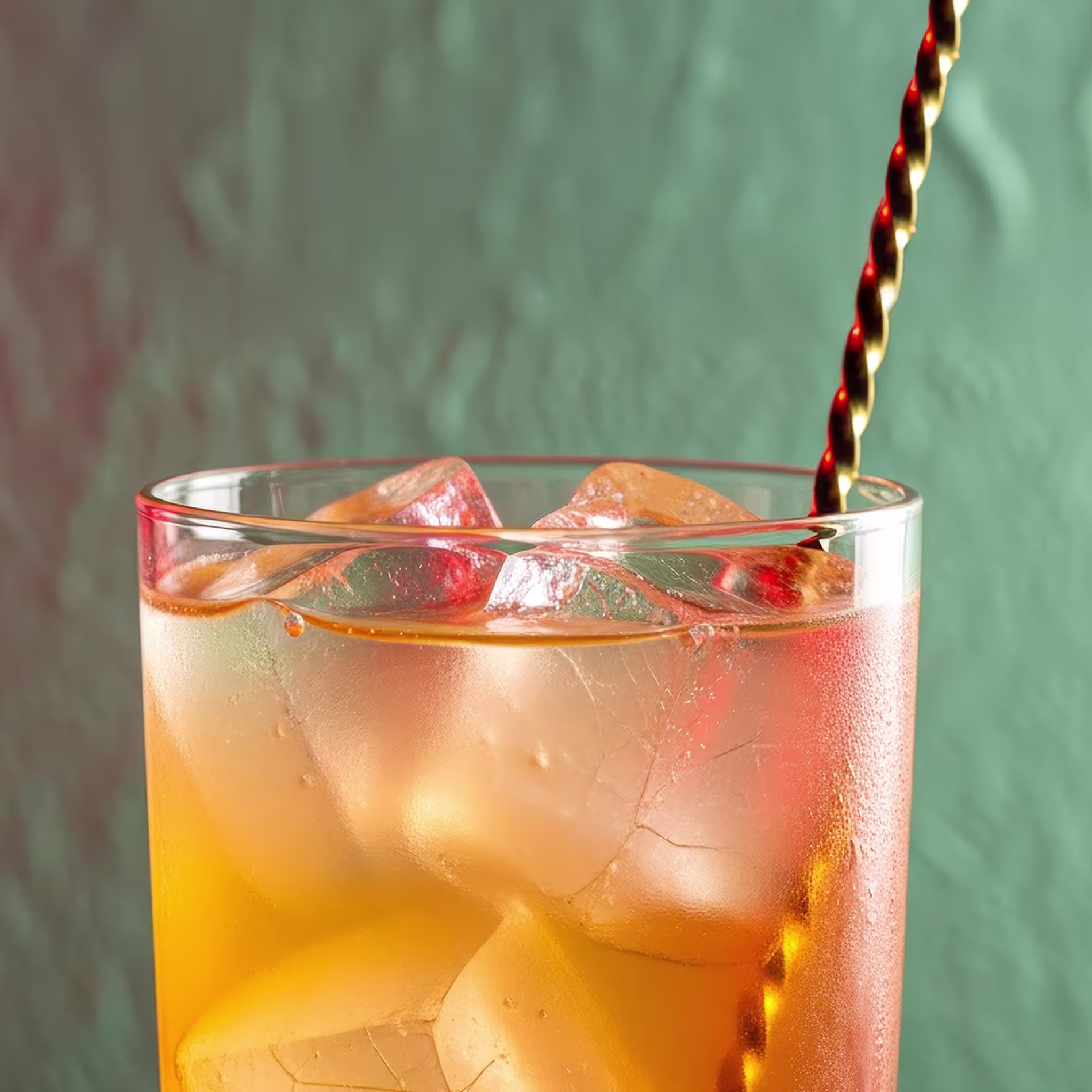 A Harvey Wallbanger being stirred