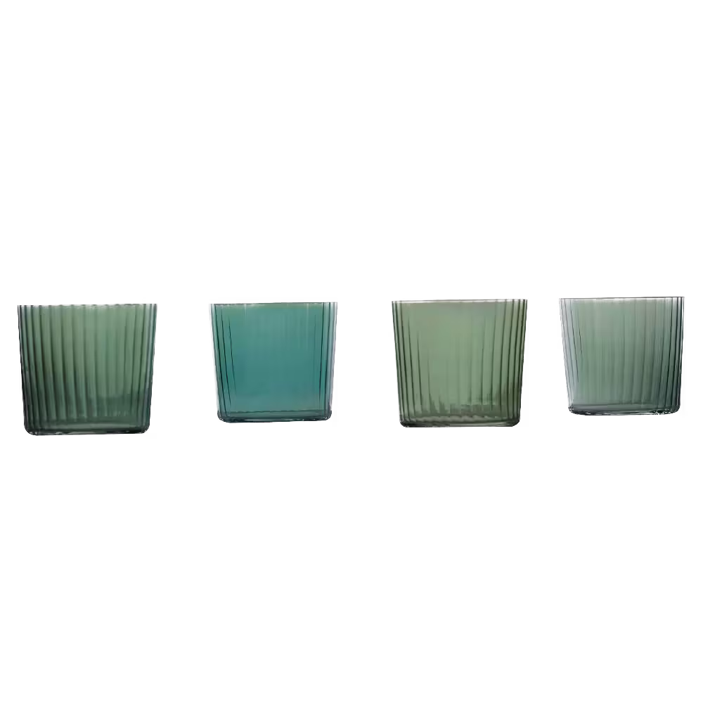 Four transparent glass tumblers, each with vertical ribbed patterns, are lined up in a row against a black background.