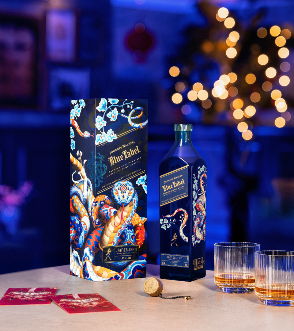 Johnnie Walker Year of the Snake next to 2 glasses