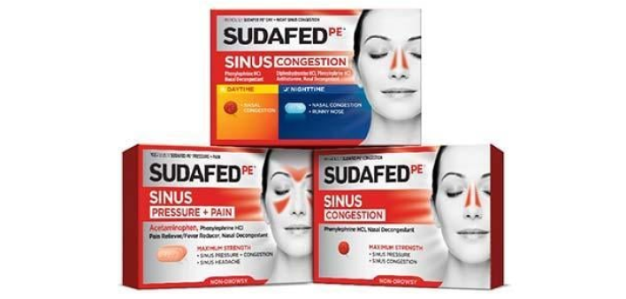 Three Sudafed Products Piled Up, two on the bottom and one on top. All facing forward.