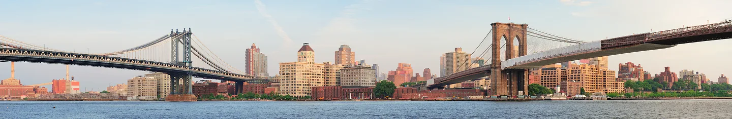 Brooklyn skyline with Brooklyn Bridge and Manhattan Bridge in foreground