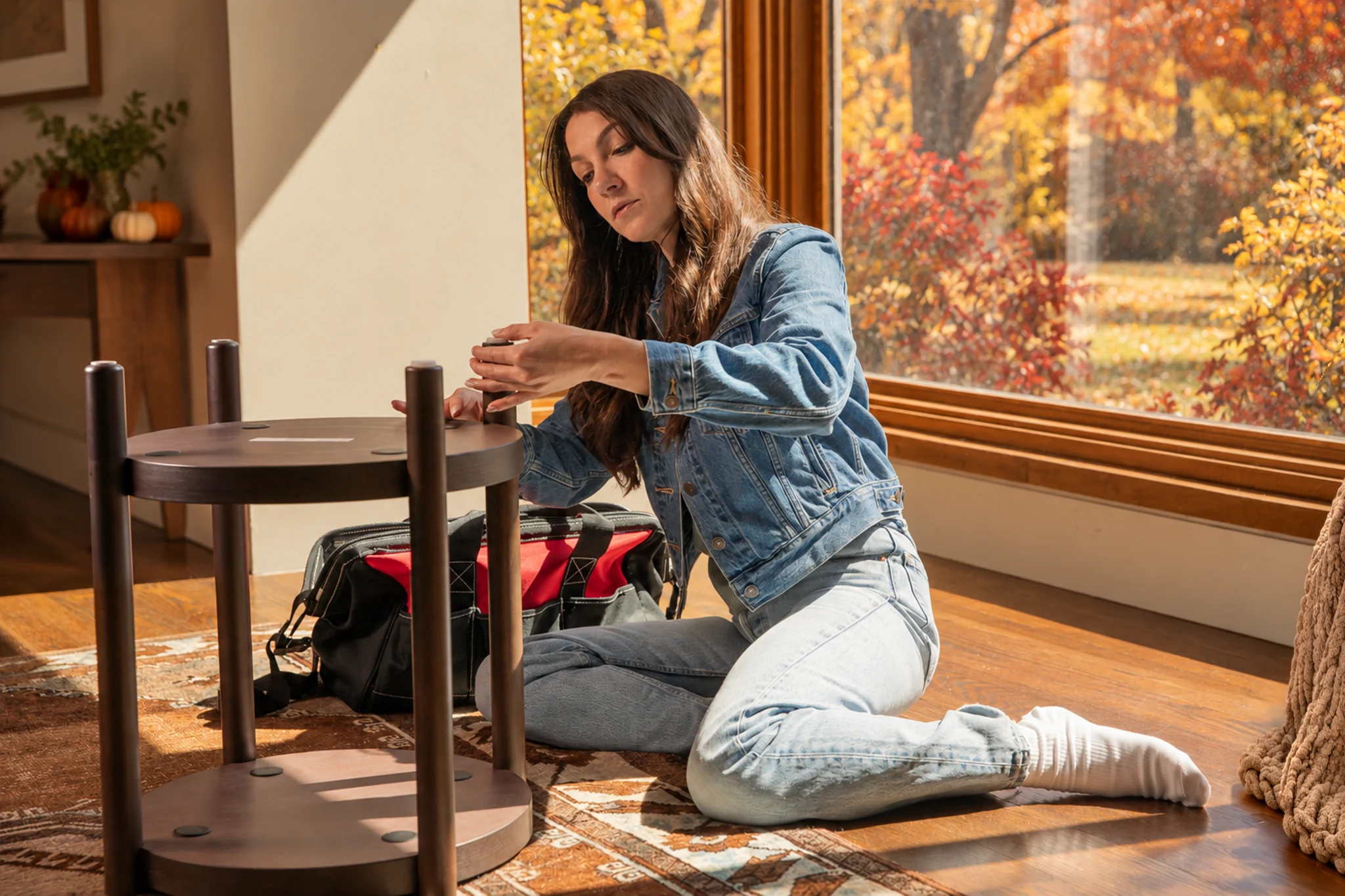 Image of a Tasker assembling furniture