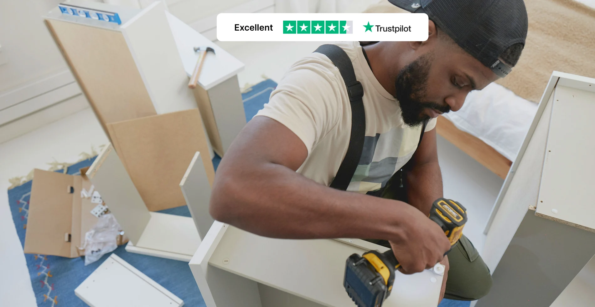 Image of a Tasker assembling furniture